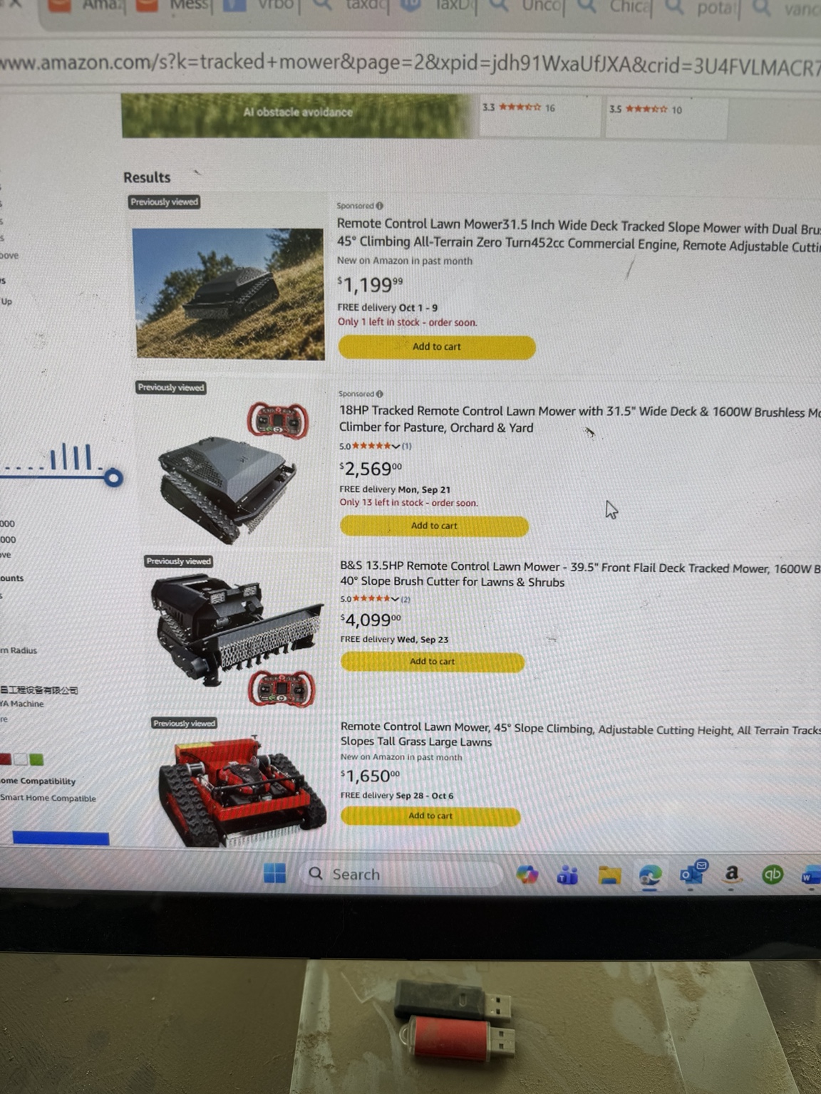 Amazon search results showing a newly listed black tracked mower above the current FenkeYiHui mower.