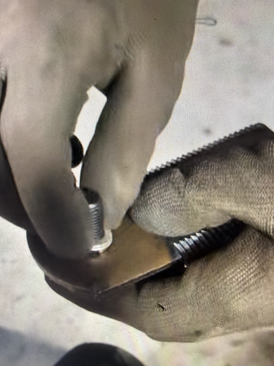 YiHui assembly video frame showing the blade assembly inserted through the carrier arm.